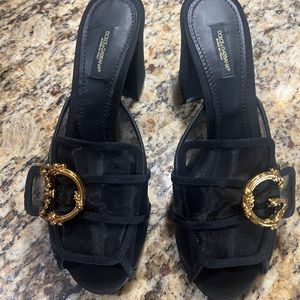 Gorgeous Black with gold DG block heel. Only worn around my house. Size 39.